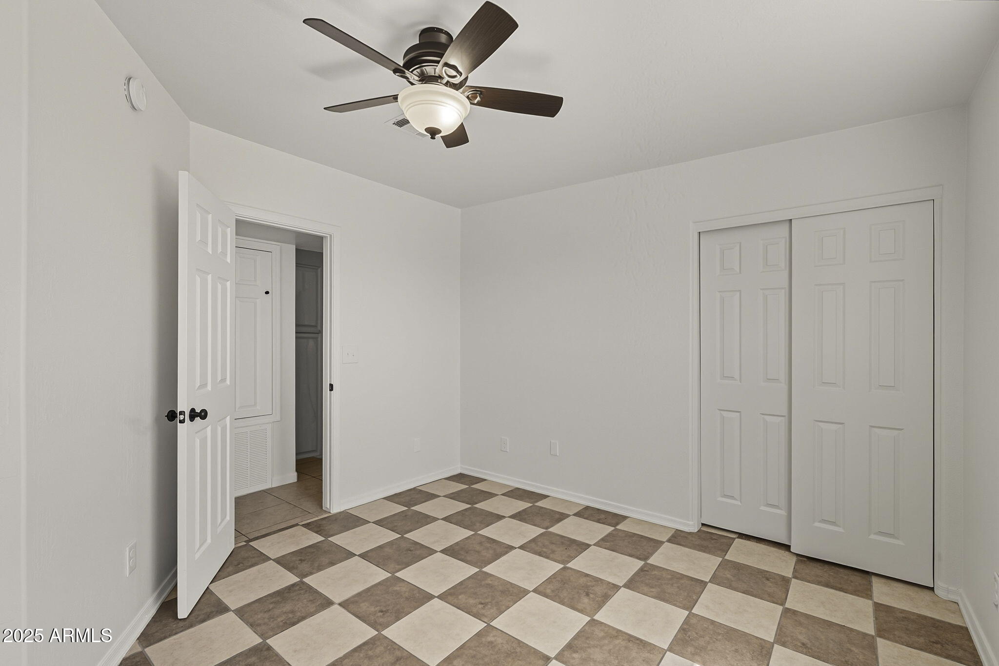 481 West Foothill Street Apache Junction, AZ 85120 - Photo 24 of 50 a view of a livingroom with a chandelier fan and wooden floor