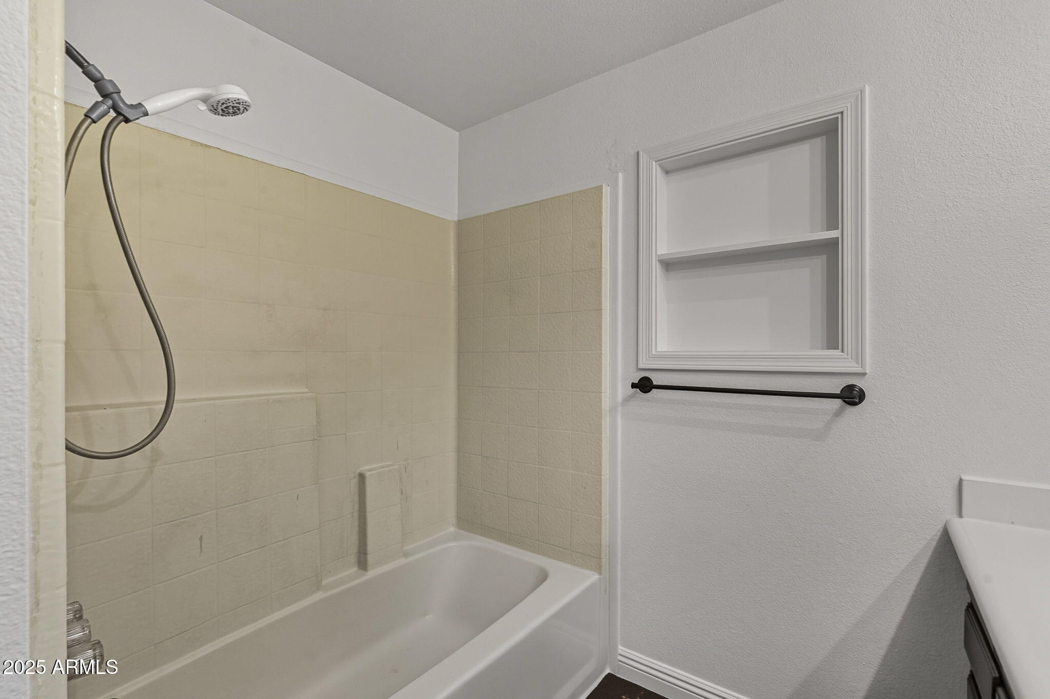 481 West Foothill Street Apache Junction, AZ 85120 - Photo 35 of 50 a bathroom with a glass shower door