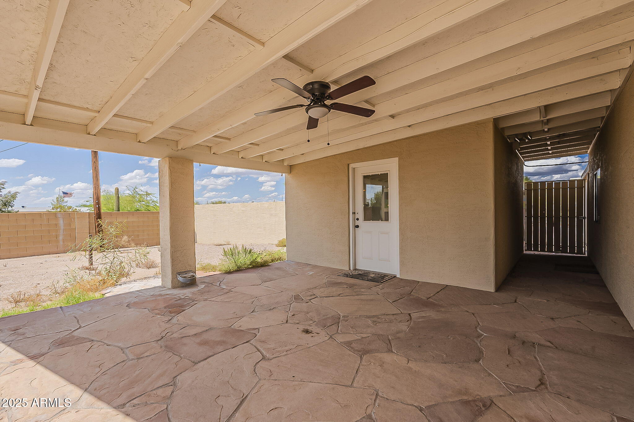 481 West Foothill Street Apache Junction, AZ 85120 - Photo 39 of 50 a view of a livingroom with a ceiling fan and window