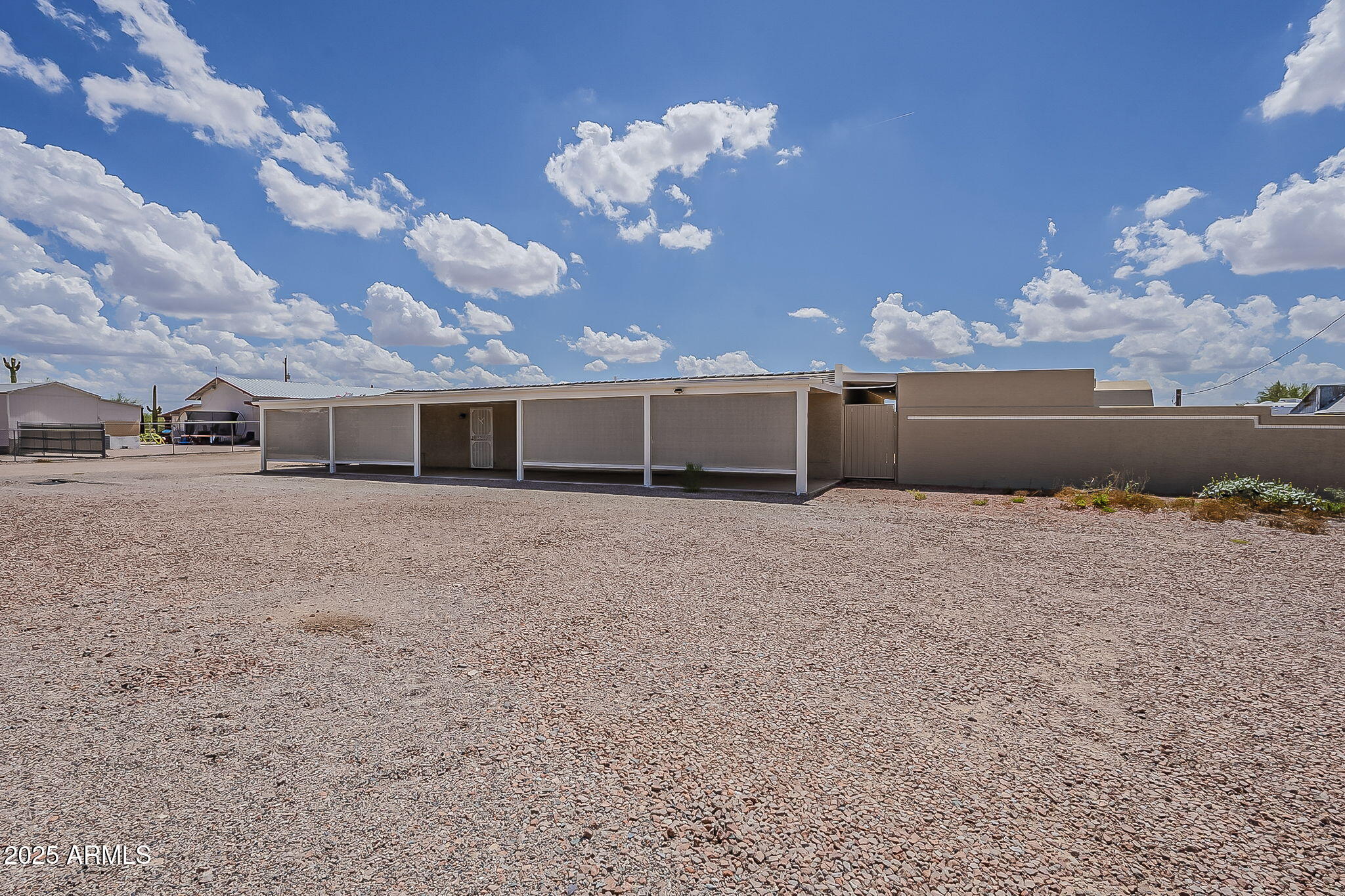 481 West Foothill Street Apache Junction, AZ 85120 - Photo 4 of 50 a view of a house with a yard