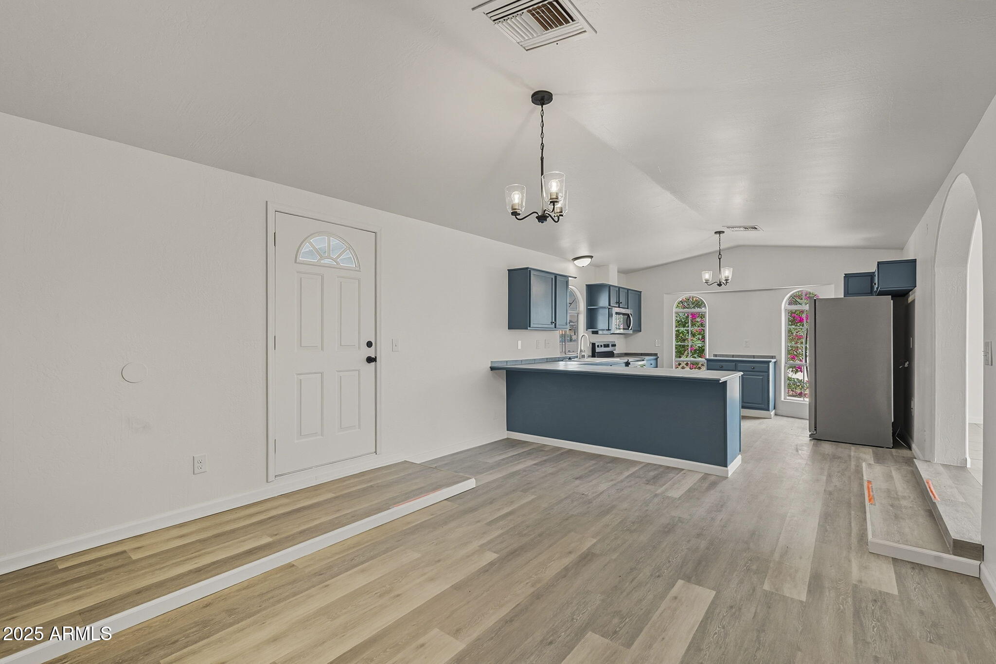 481 West Foothill Street Apache Junction, AZ 85120 - Photo 7 of 50 a view of a kitchen with a sink stainless steel appliances and cabinets