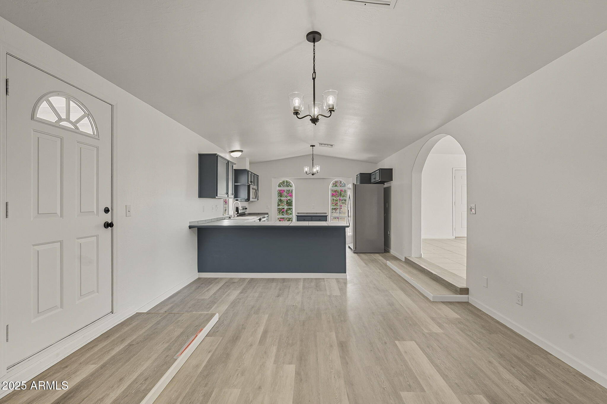 481 West Foothill Street Apache Junction, AZ 85120 - Photo 8 of 50 a large kitchen with a sink stainless steel appliances and cabinets