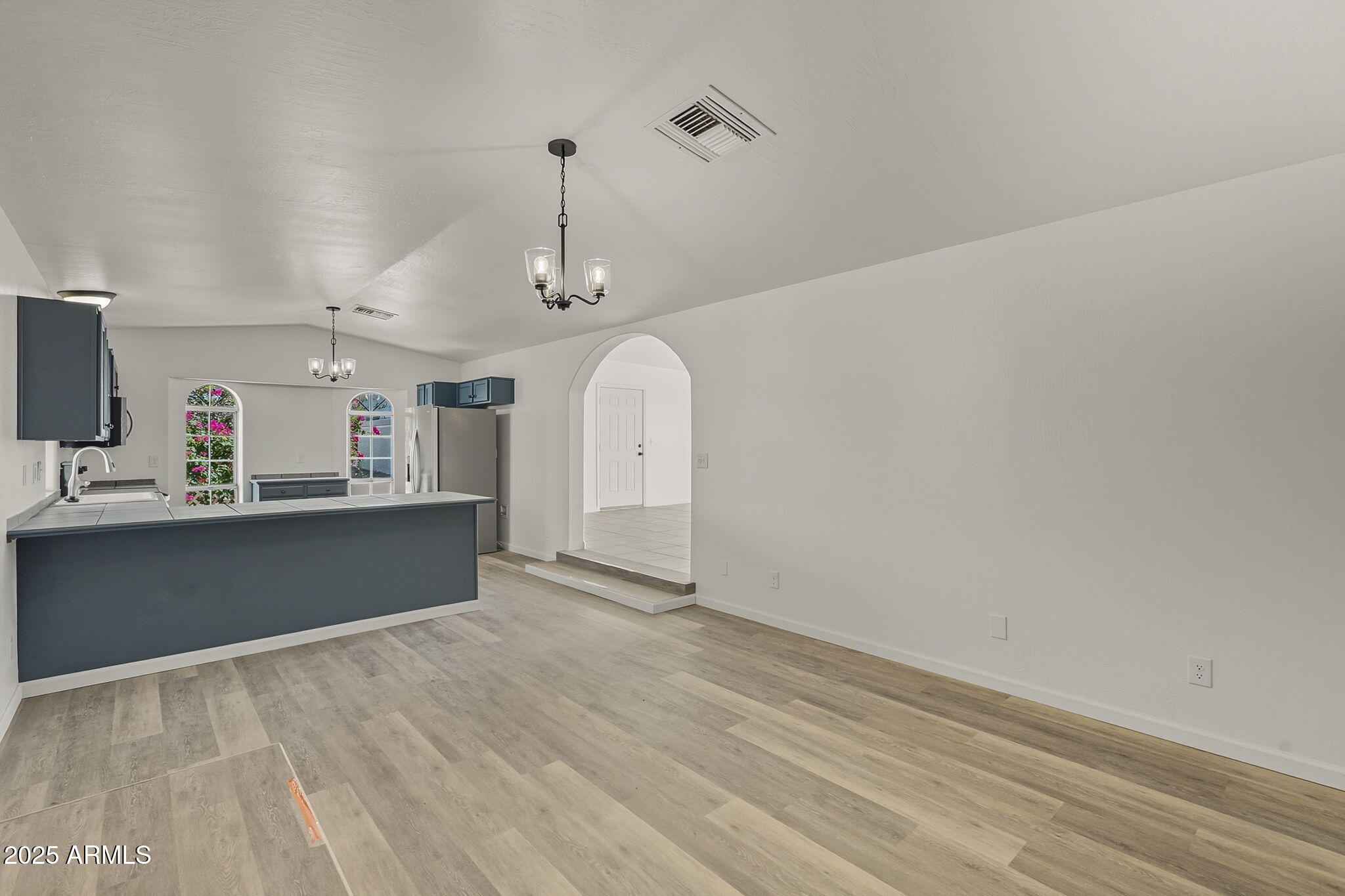 481 West Foothill Street Apache Junction, AZ 85120 - Photo 9 of 50 a view of a livingroom with wooden floor