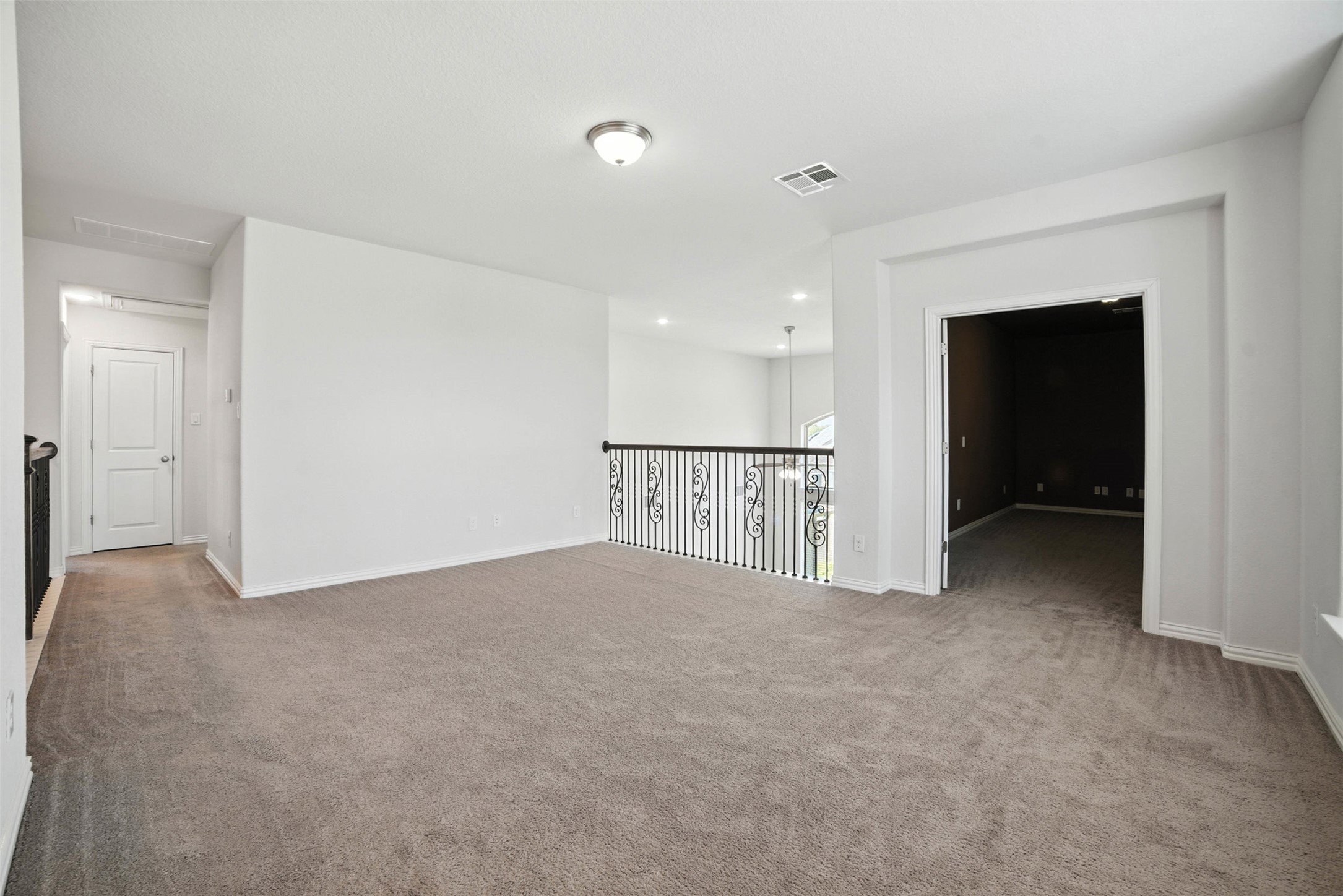 3054 Columbus Loop Round Rock, TX 78665 - Photo 21 of 40 Unfurnished room featuring carpet and recessed lighting