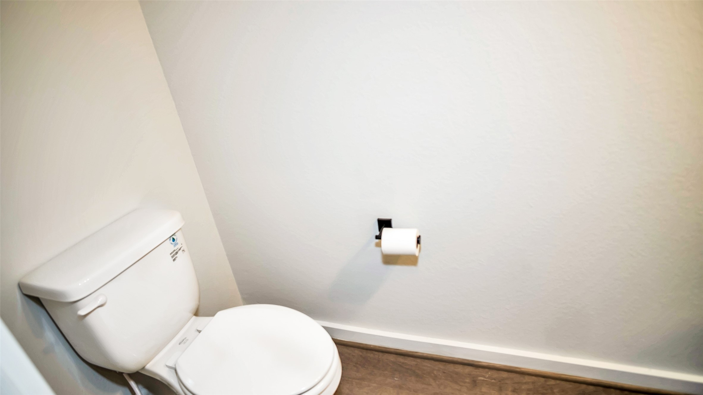 1919 Pueblo Nuevo Path Houston, TX 77077 - Photo 37 of 50 a white toilet sitting next to a white wall