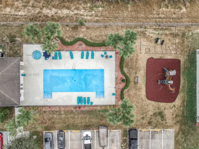 a kitchen with cabinets and stainless steel appliances