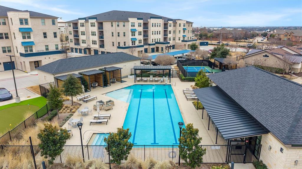 651 Watters Road, Unit 5205 Allen, TX 75013 - Photo 25 of 31 a aerial view of a house with a swimming pool