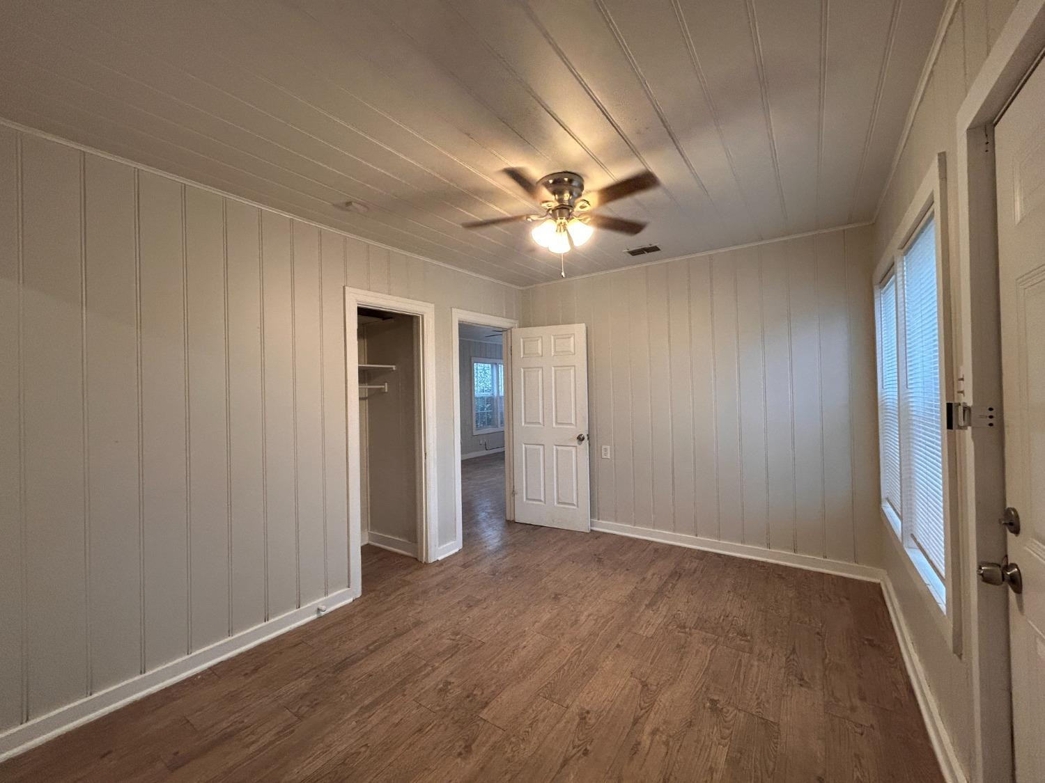 1925 26th Street Lubbock, TX 79411 - Photo 7 of 10 a view of an empty room with closet and a window