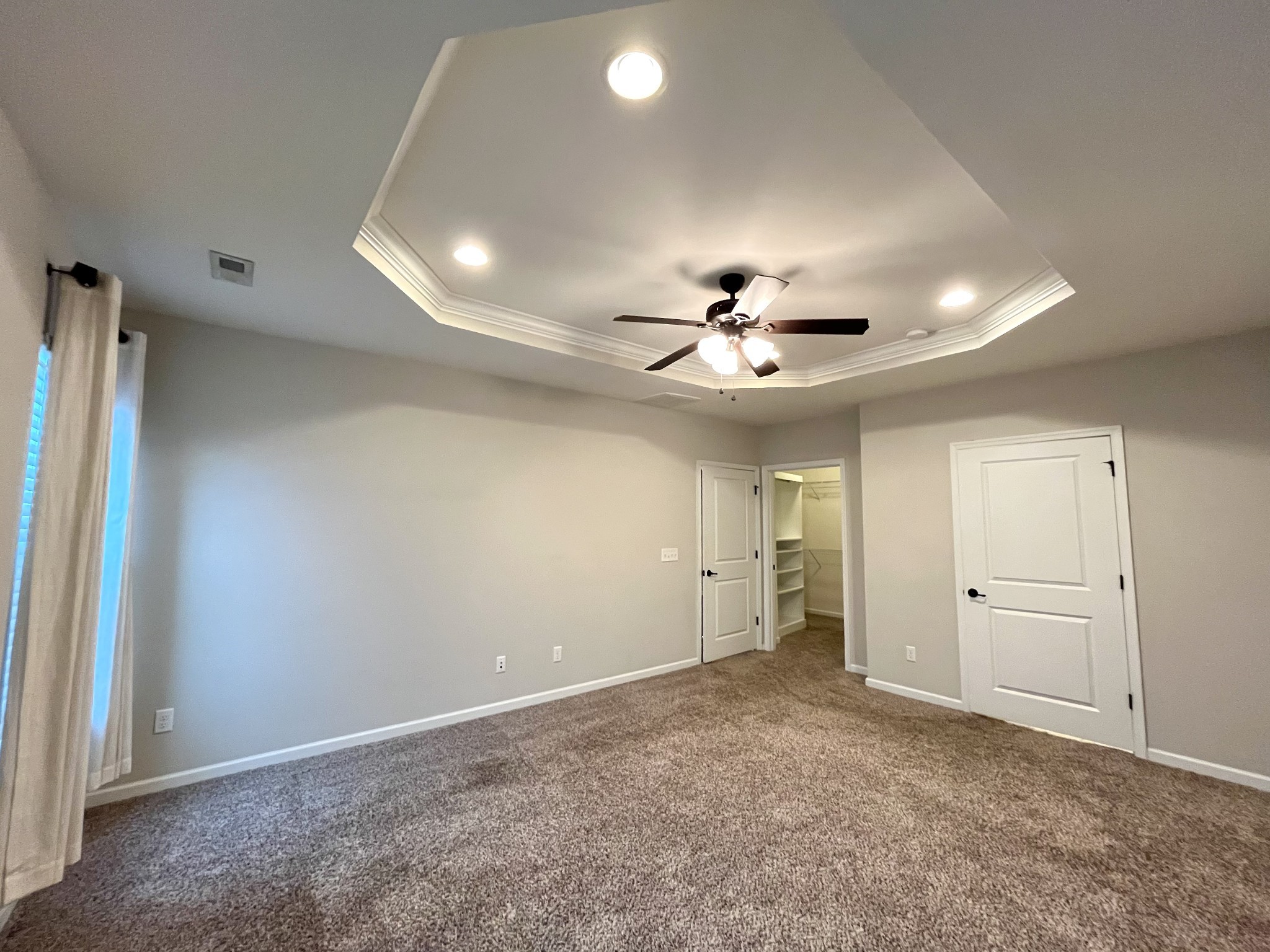 2817 Bluestem Lane Murfreesboro, TN 37128 - Photo 20 of 33 an empty room with closet and a ceiling fan