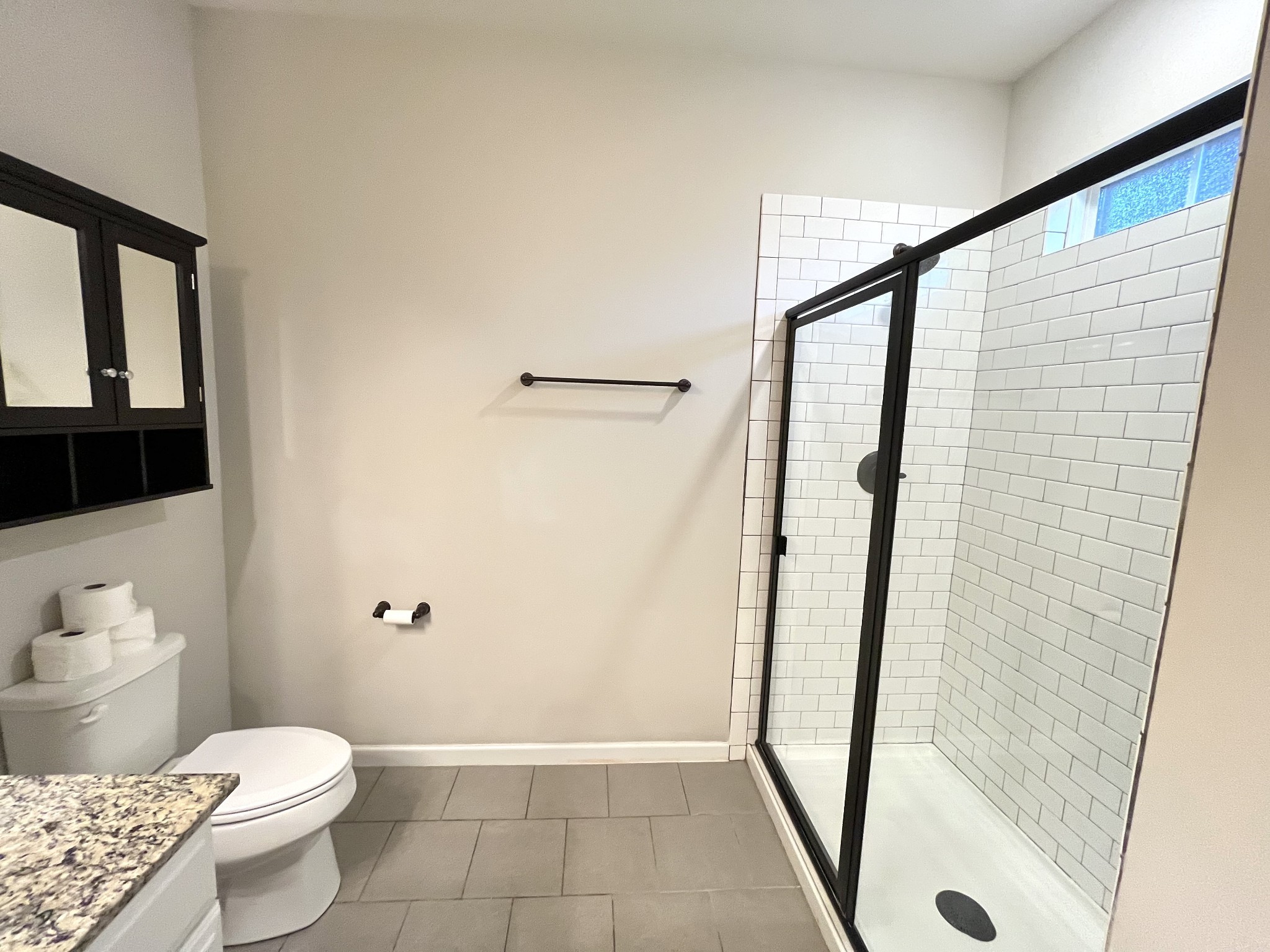 2817 Bluestem Lane Murfreesboro, TN 37128 - Photo 22 of 33 a bathroom with a granite countertop sink toilet and shower