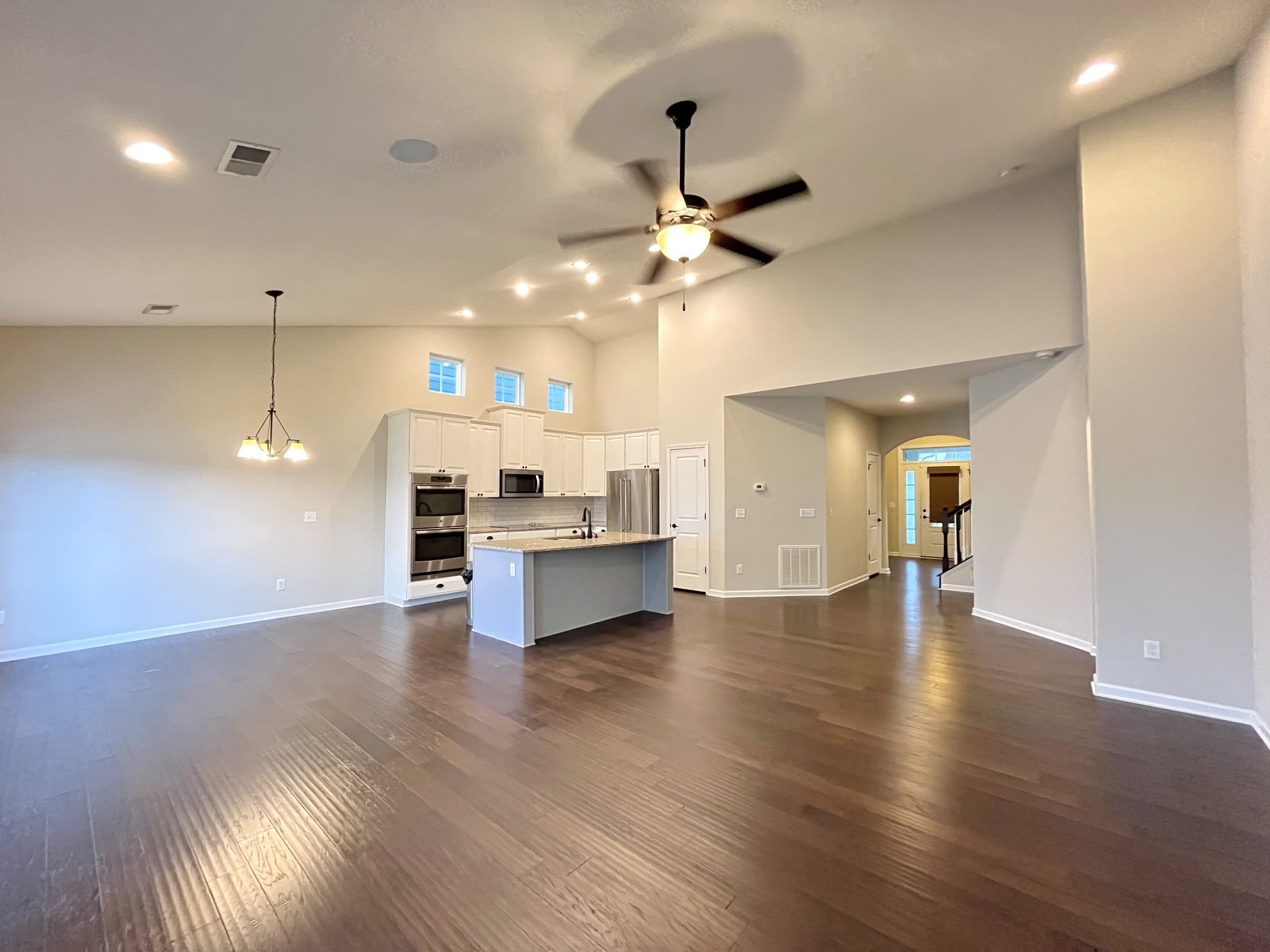 2817 Bluestem Lane Murfreesboro, TN 37128 - Photo 29 of 33 a view of a kitchen with a sink and a stove top oven