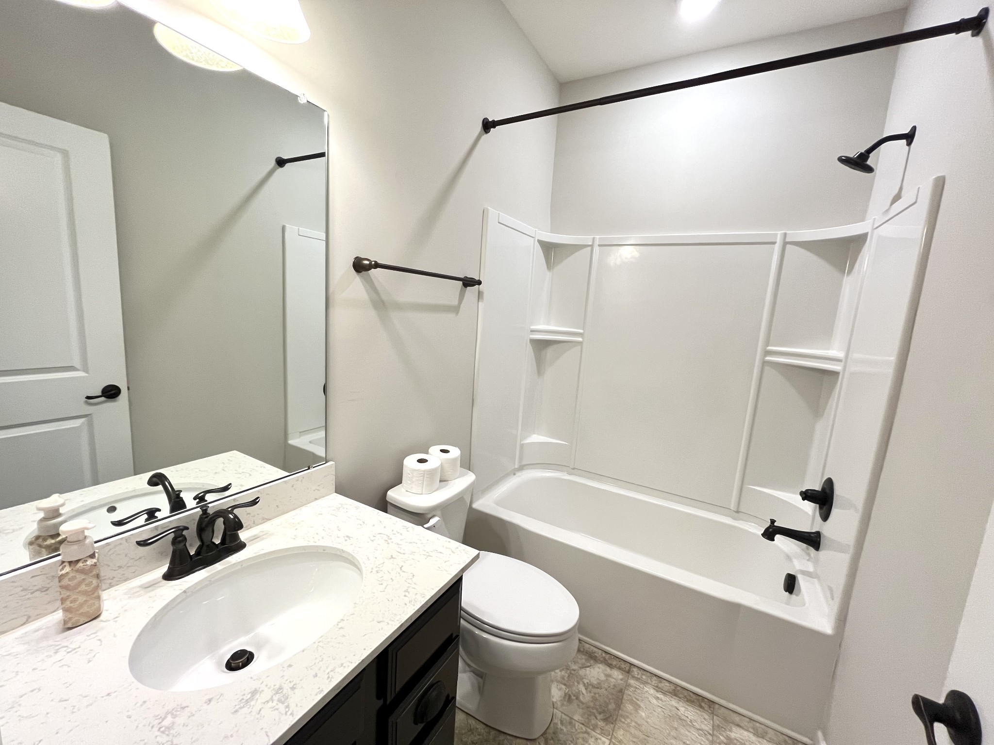 2817 Bluestem Lane Murfreesboro, TN 37128 - Photo 6 of 33 a bathroom with a sink mirror toilet and bathtub
