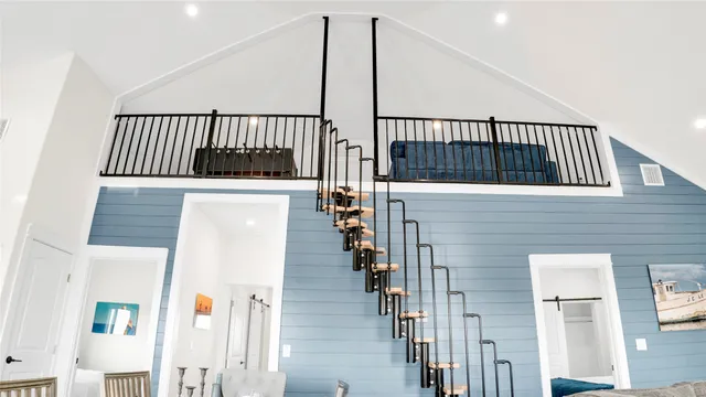 a view of a bathroom with wooden floor