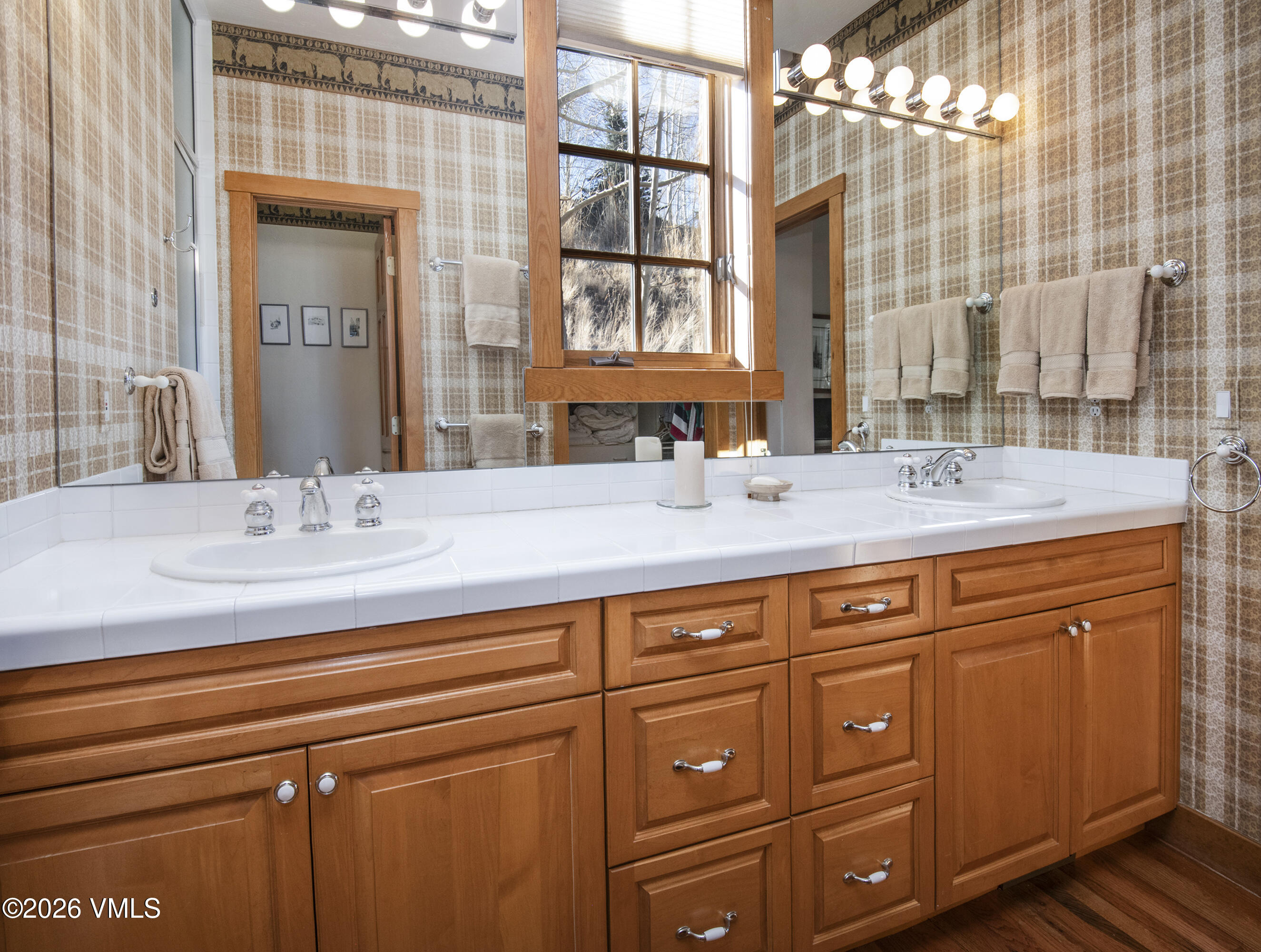 181 Club Cottage Drive Edwards, CO 81632 - Photo 17 of 34 a bathroom with a sink and a mirror