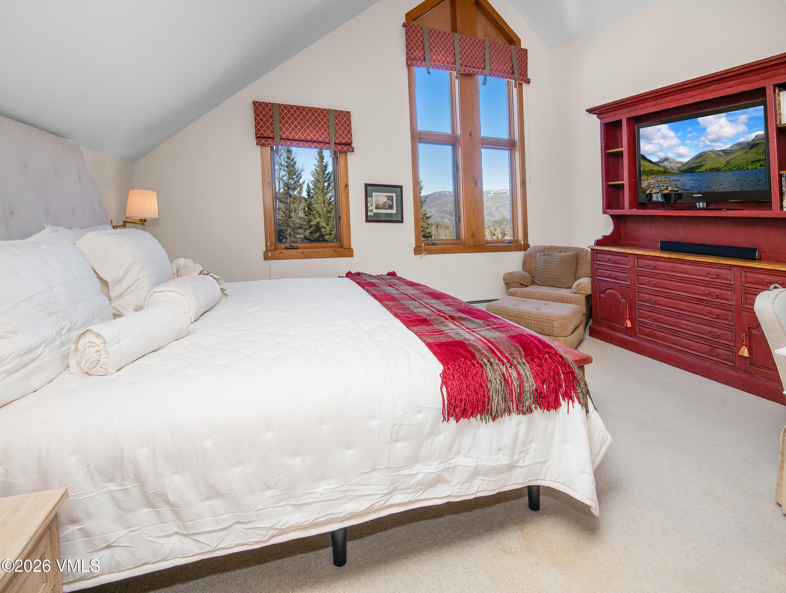 181 Club Cottage Drive Edwards, CO 81632 - Photo 20 of 34 a bed sitting in a bedroom next to a window