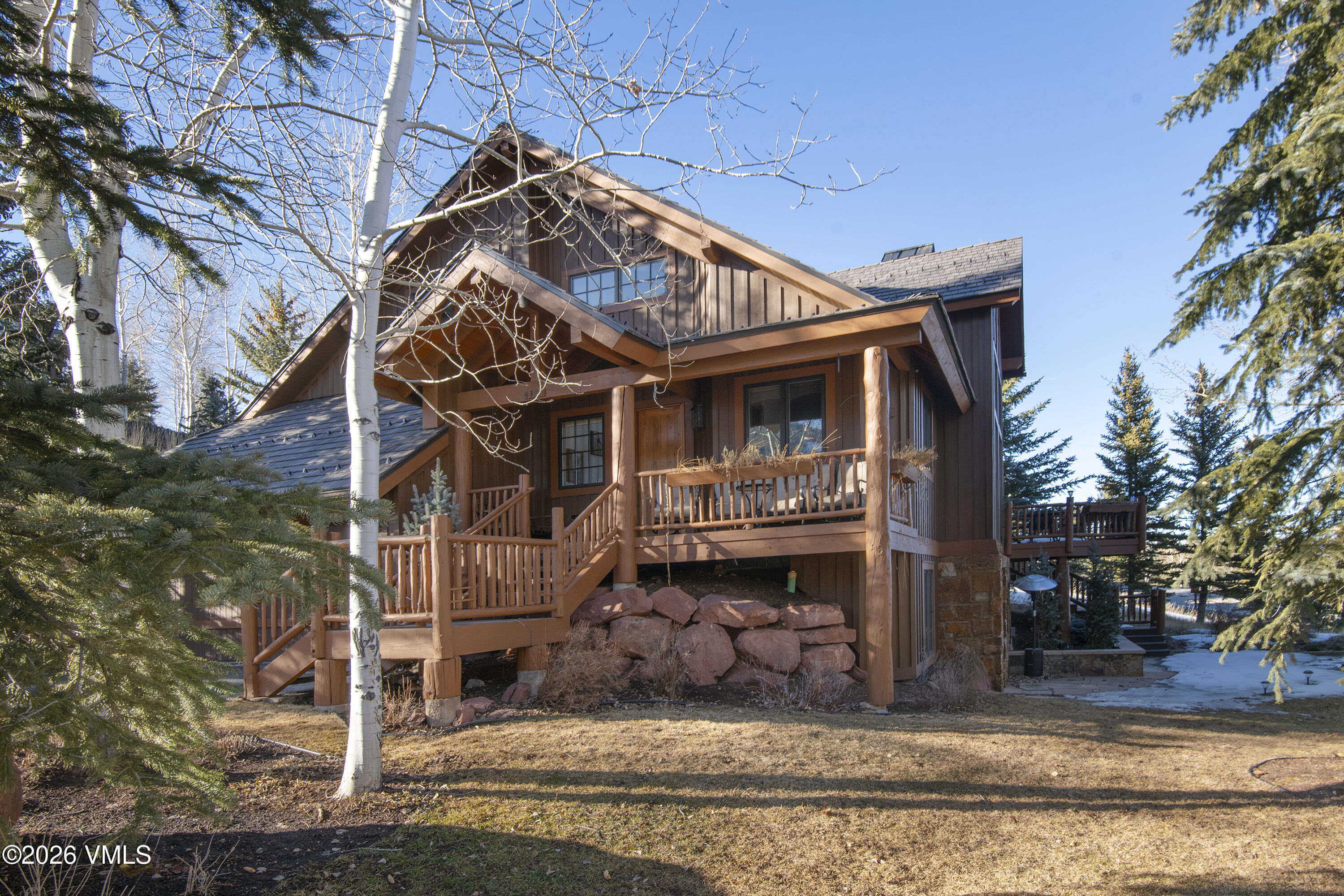 181 Club Cottage Drive Edwards, CO 81632 - Photo 32 of 34 a front view of a house with a yard