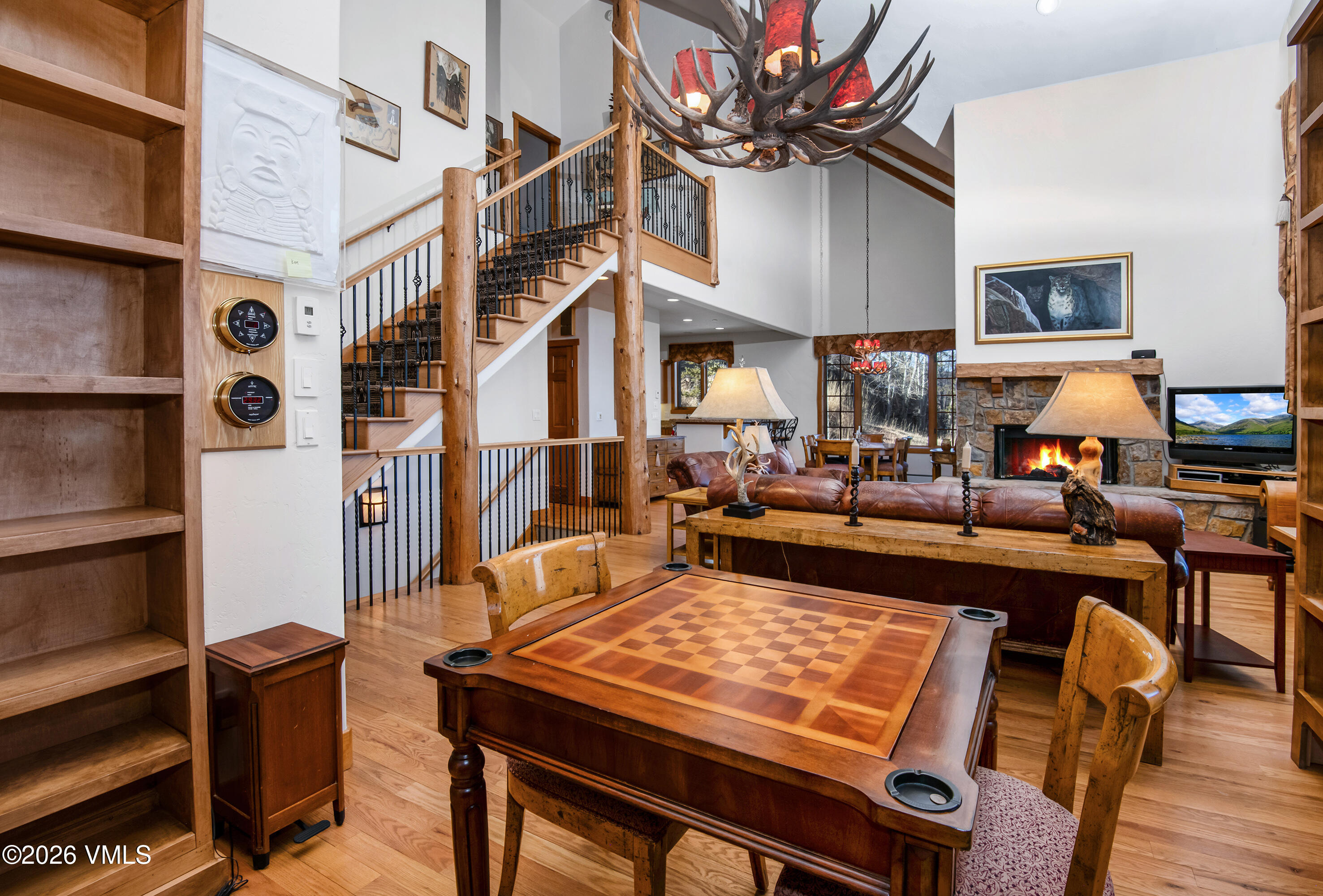 181 Club Cottage Drive Edwards, CO 81632 - Photo 8 of 34 a living room with fireplace furniture and a wooden floor