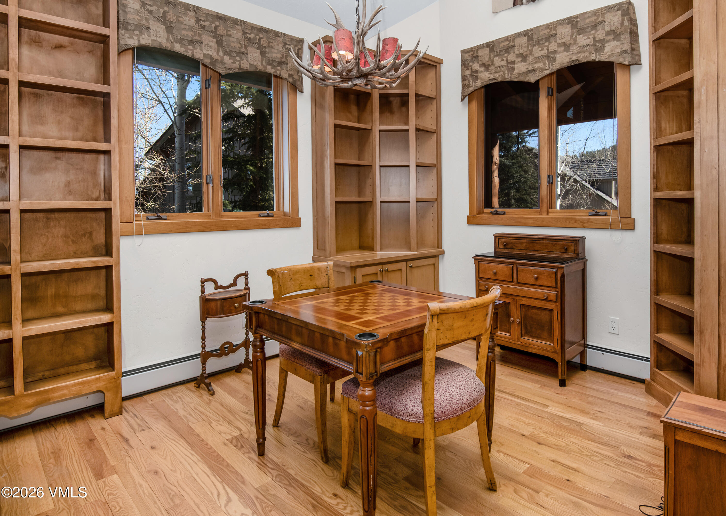 181 Club Cottage Drive Edwards, CO 81632 - Photo 9 of 34 a dinning table and chairs in front of a house