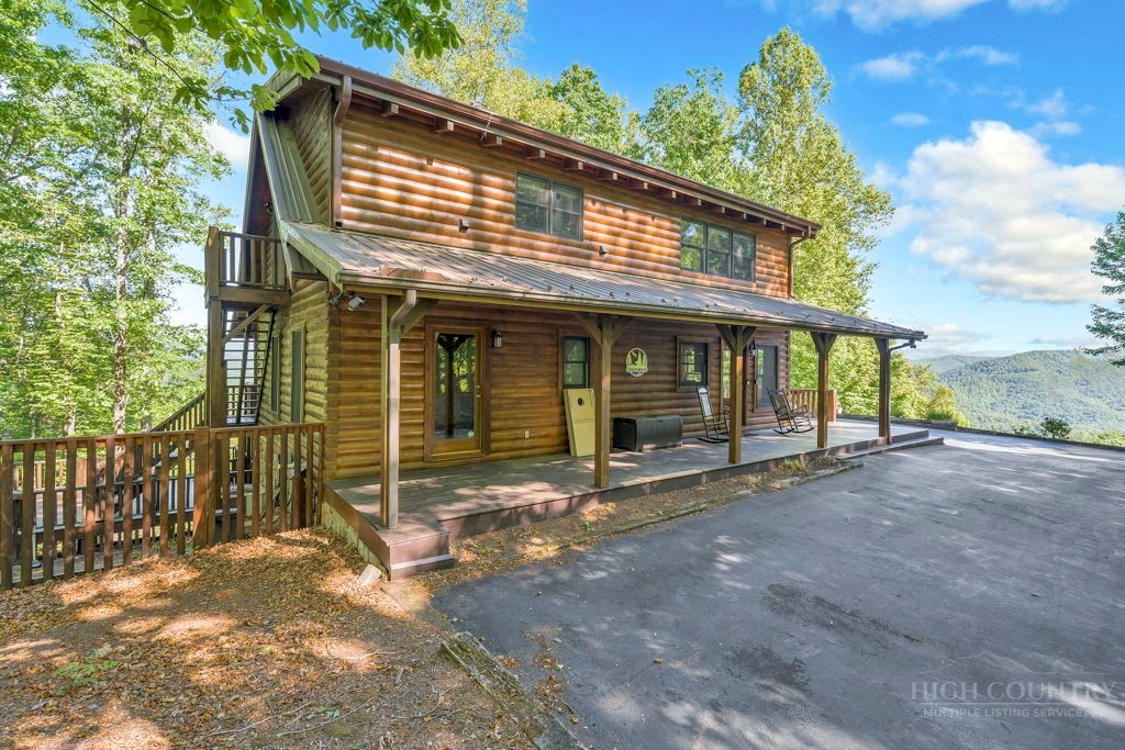 2229 Elk Ridge Road Ferguson, NC 28624 - Photo 2 of 42 a view of a house with a porch