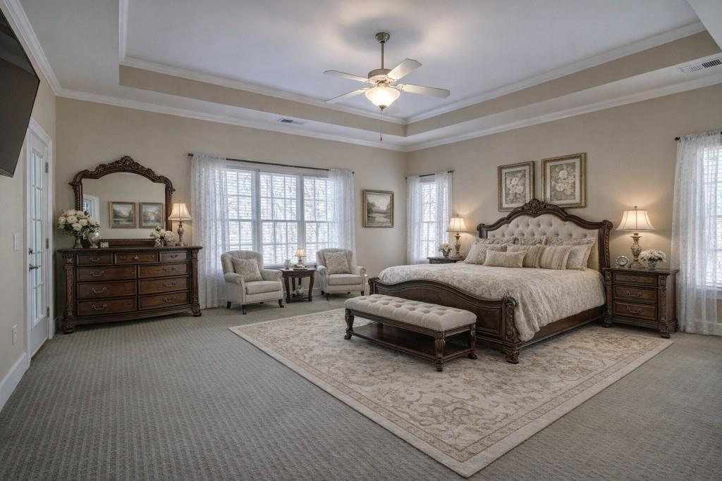 302 Waterfall Court Canton, GA 30115 - Photo 17 of 80 a spacious bedroom with a bed a dresser and a chandelier