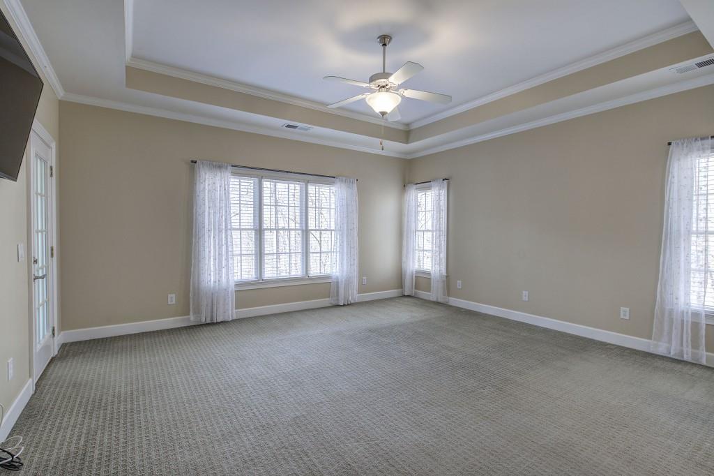302 Waterfall Court Canton, GA 30115 - Photo 18 of 80 a view of an empty room with a window