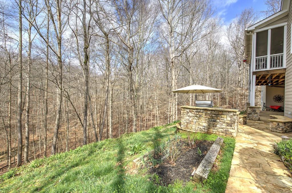 302 Waterfall Court Canton, GA 30115 - Photo 50 of 80 a front view of a house with a yard