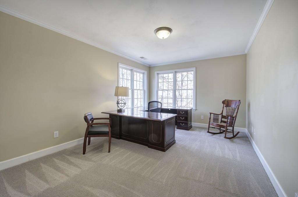302 Waterfall Court Canton, GA 30115 - Photo 60 of 80 a living room with furniture and a window