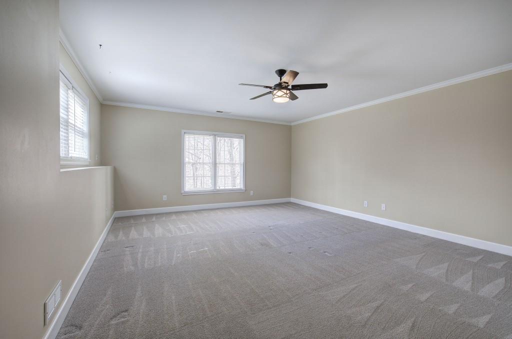 302 Waterfall Court Canton, GA 30115 - Photo 62 of 80 a view of an empty room with a window