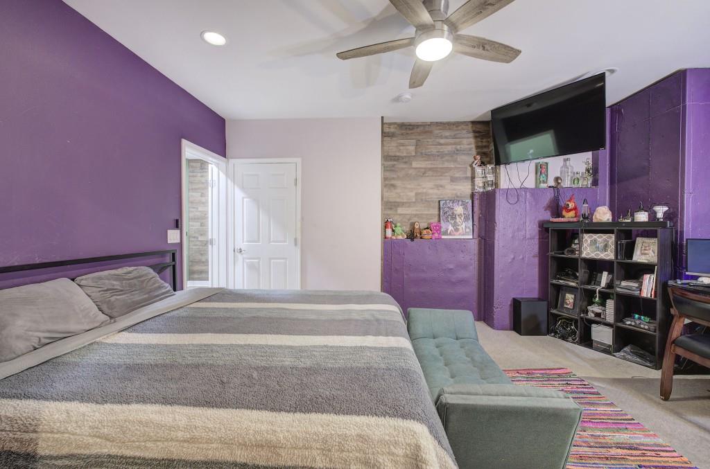 302 Waterfall Court Canton, GA 30115 - Photo 68 of 80 a living room with furniture and a flat screen tv