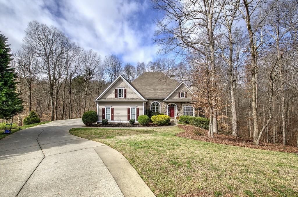 302 Waterfall Court Canton, GA 30115 - Photo 73 of 80 front view of a house with a yard