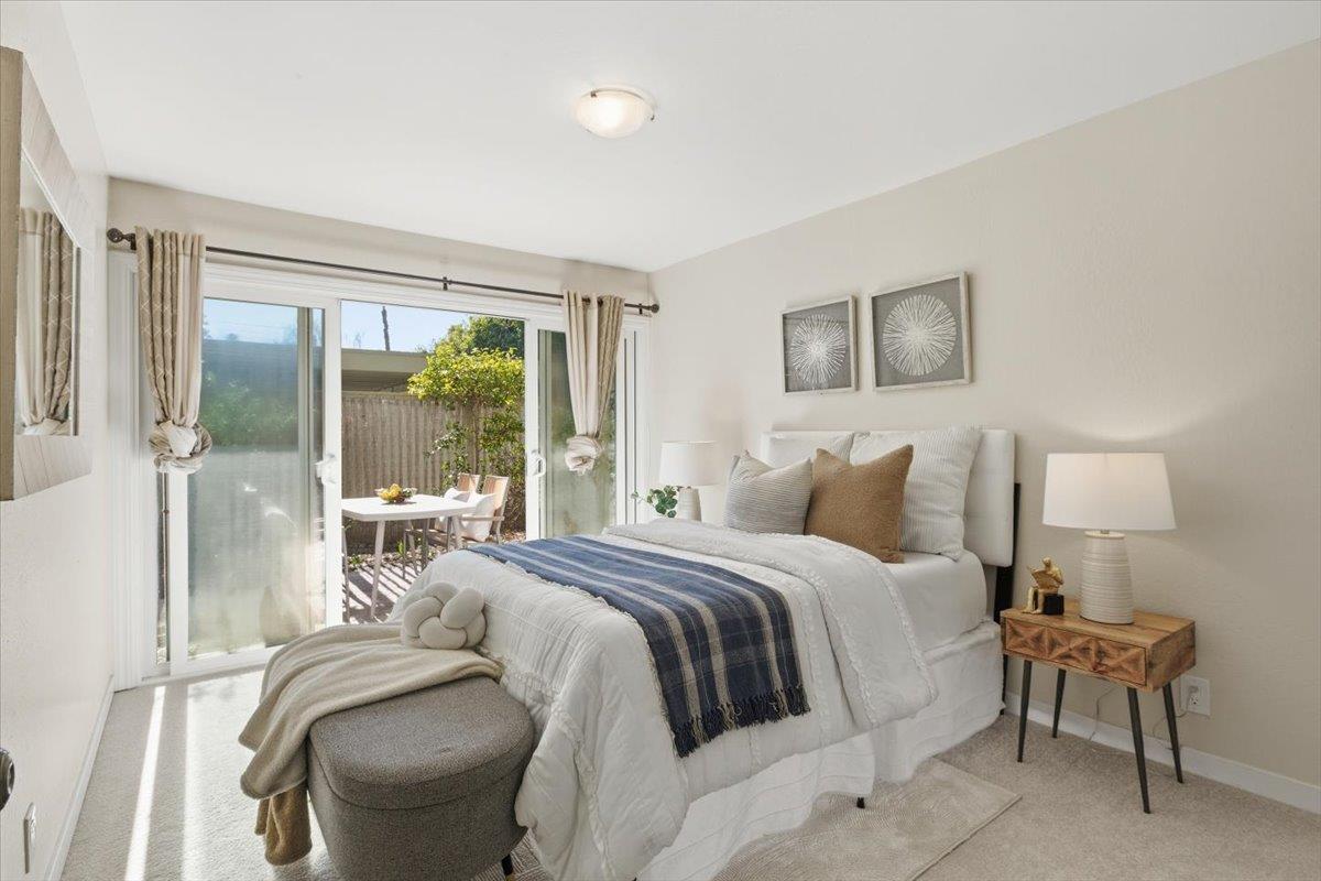 280 Easy Street, Unit 307 Mountain View, CA 94043 - Photo 18 of 30 a bedroom with a bed and a large window