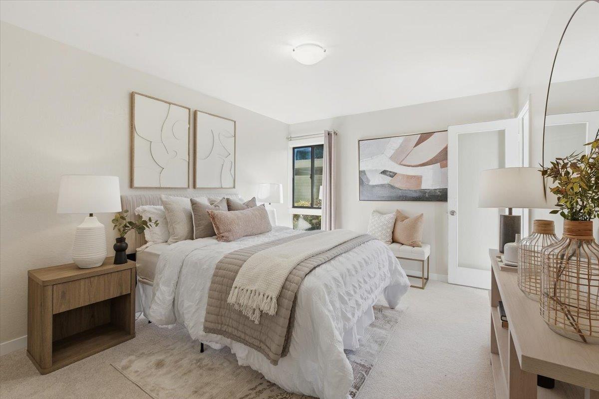 280 Easy Street, Unit 307 Mountain View, CA 94043 - Photo 25 of 30 a bed room with a bed and a chair