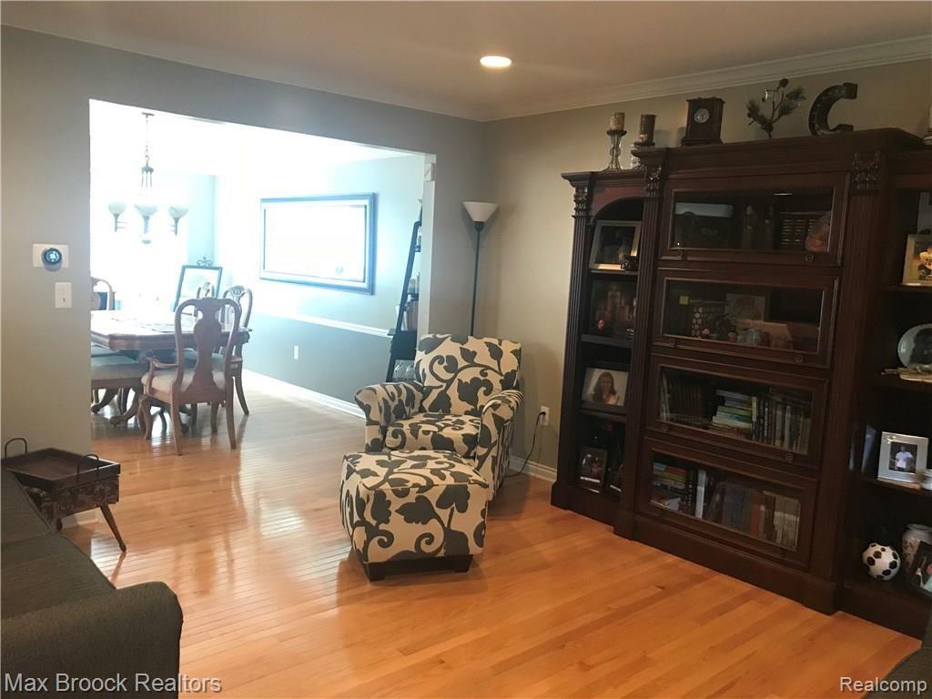 35 Ridge Field Court Oxford, MI 48371 - Photo 13 of 23 Large formal living room adjacent to dining