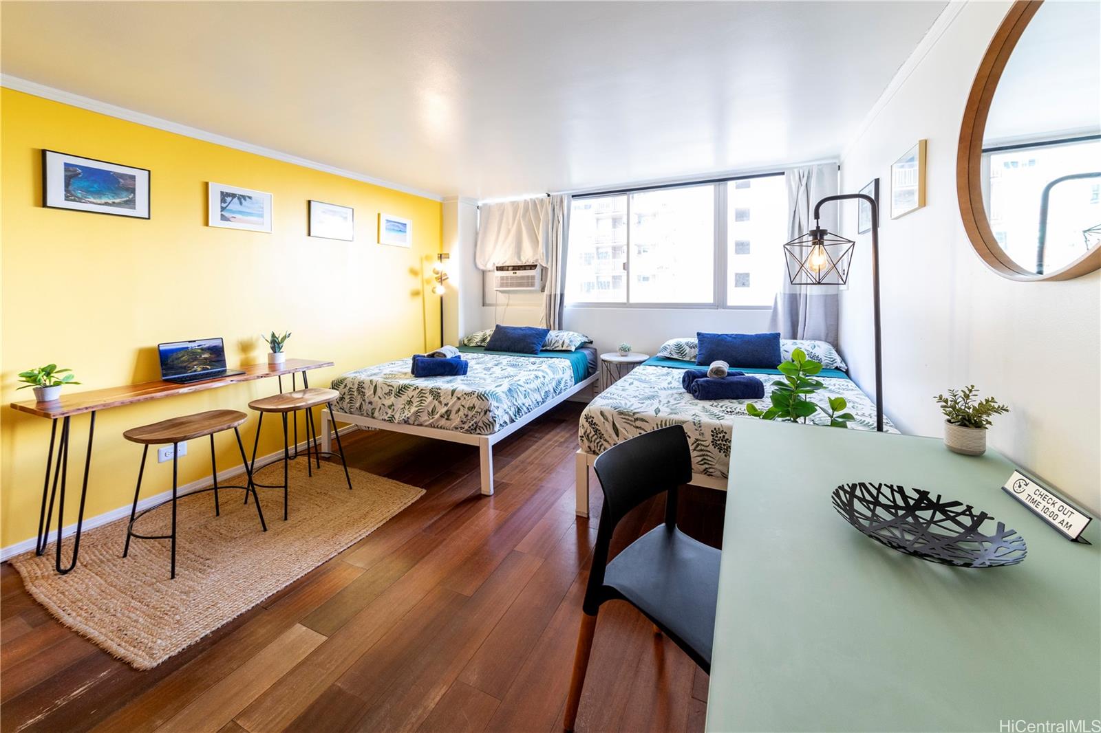 2572 Lemon Road, Unit 1105 Honolulu, HI 96815 - Photo 1 of 5 a living room with furniture and a table