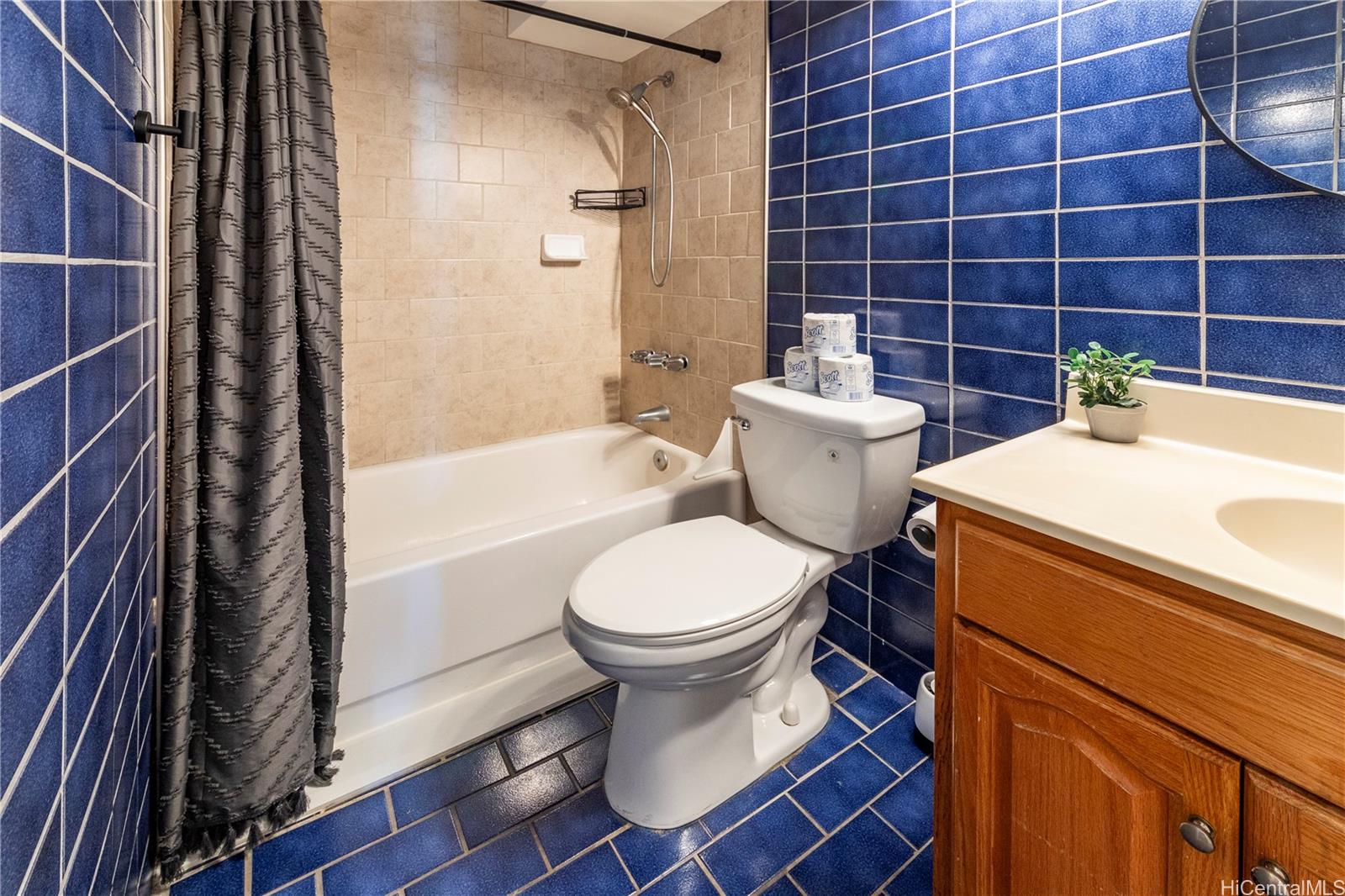 2572 Lemon Road, Unit 1105 Honolulu, HI 96815 - Photo 5 of 5 a bathroom with a sink toilet and shower
