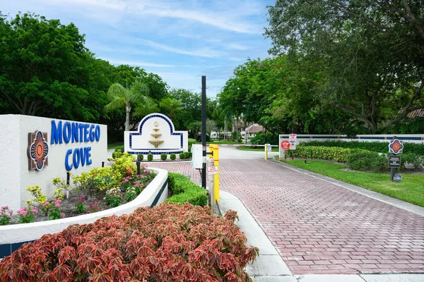 a view of a park with welcome board