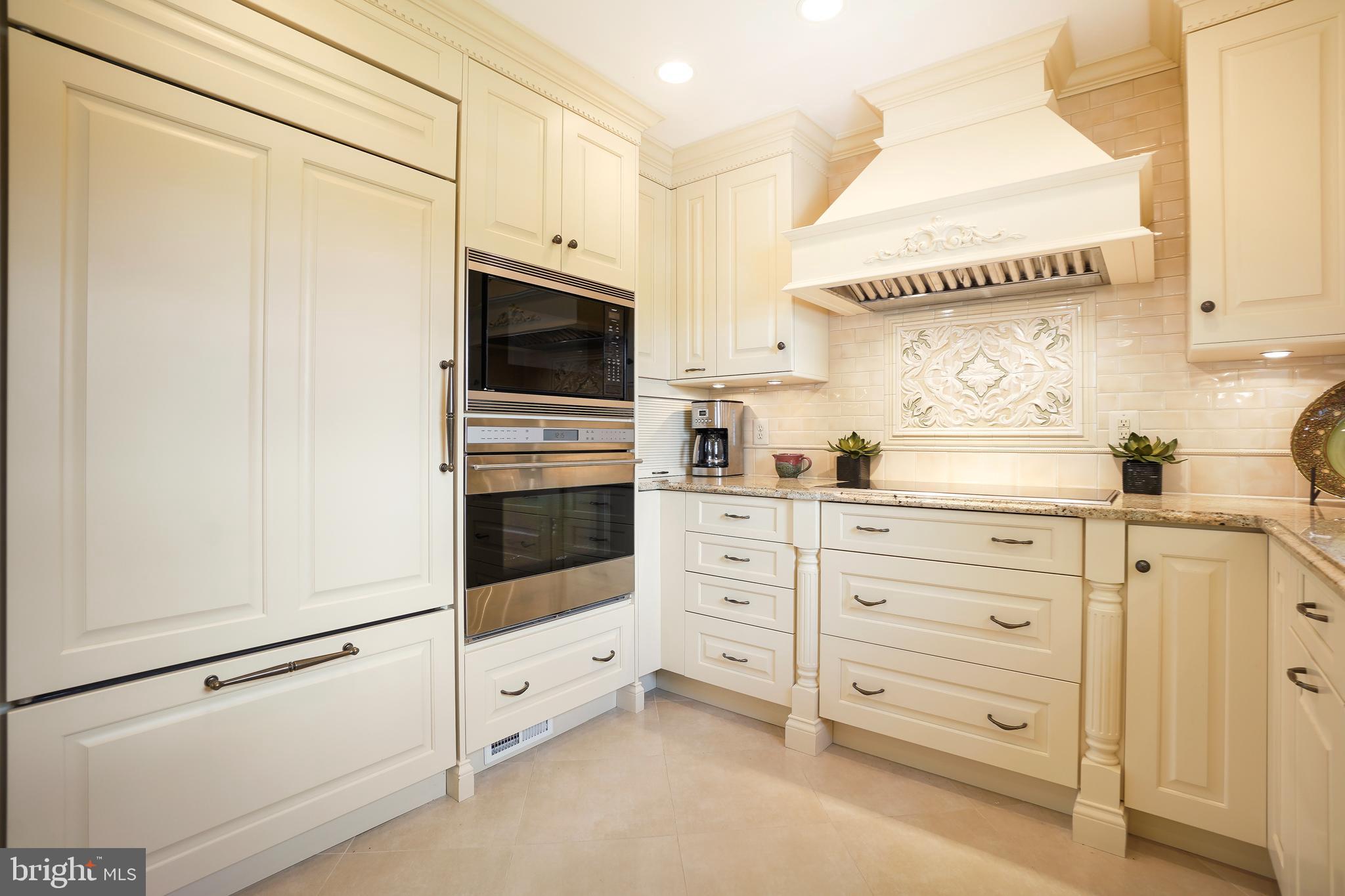 14716 Silverstone Drive Silver Spring, MD 20905 - Photo 12 of 48 Wolf smooth top downdraft cook-top!