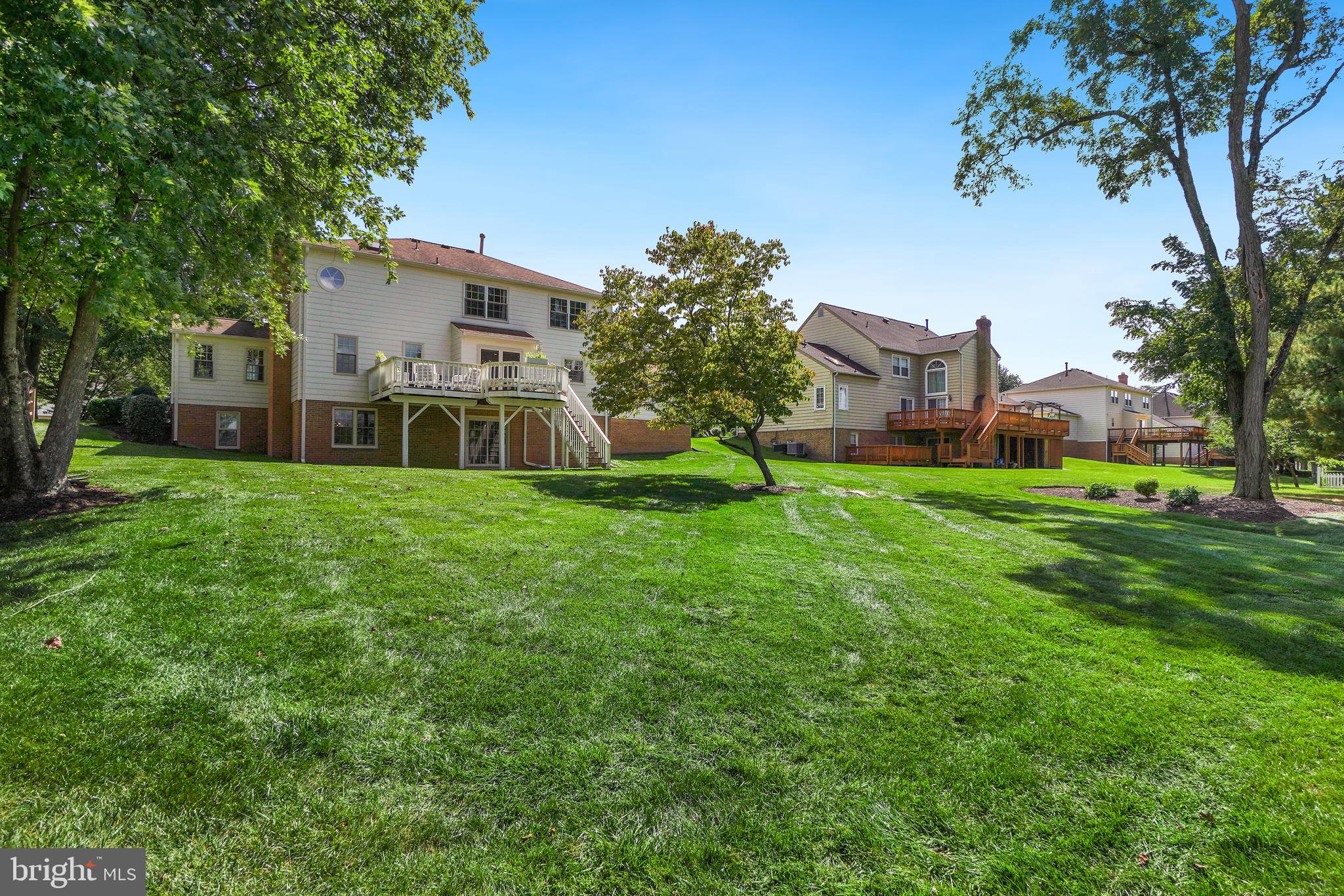 14716 Silverstone Drive Silver Spring, MD 20905 - Photo 45 of 48 Rear view of home, lots of green space!