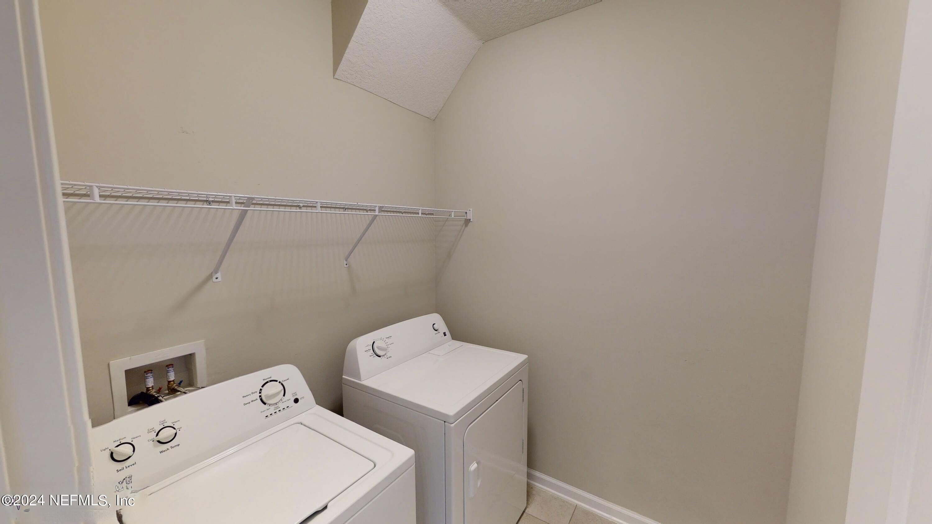 212 Concave Lane St. Augustine, FL 32095 - Photo 20 of 24 a utility room with dryer and washer