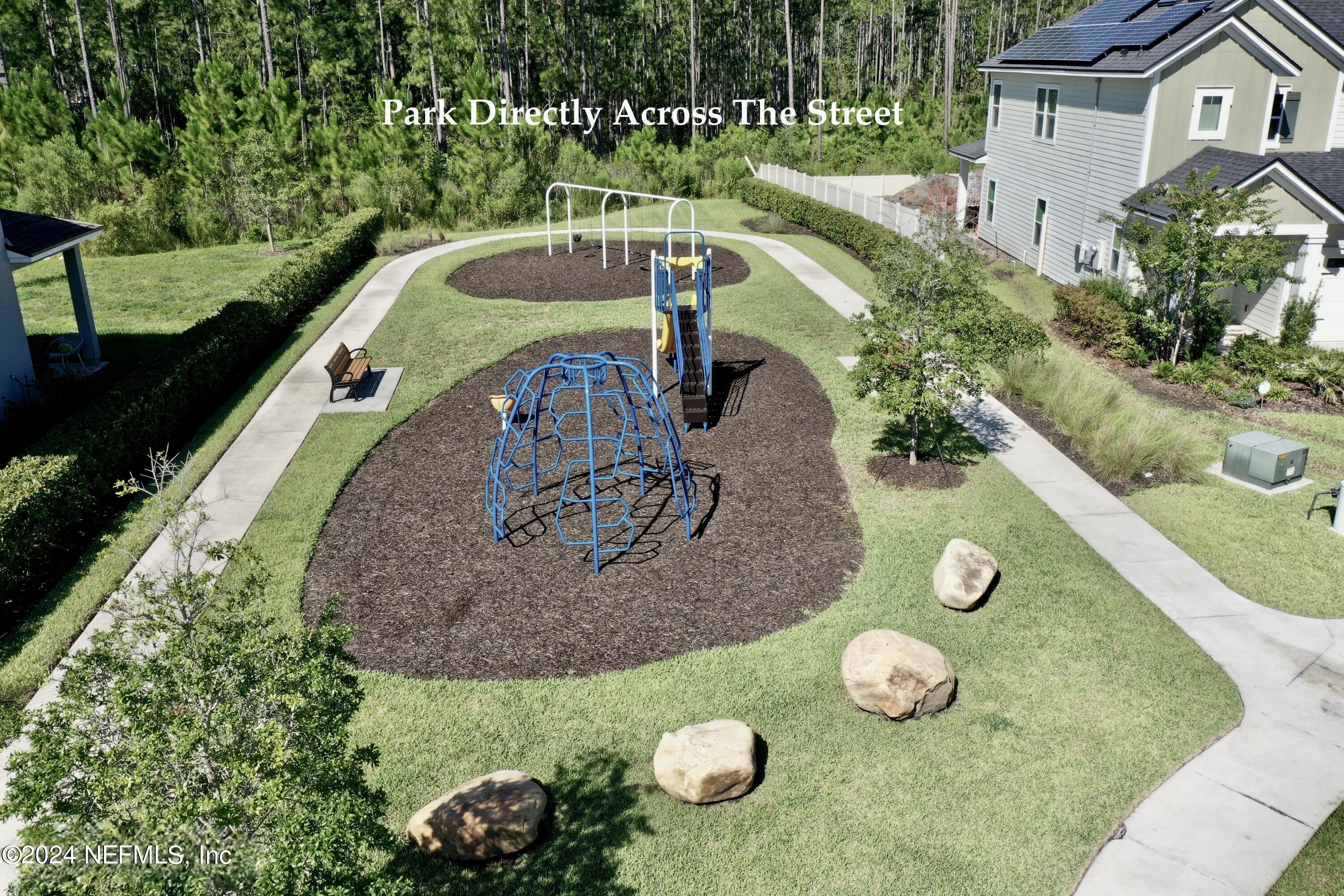 212 Concave Lane St. Augustine, FL 32095 - Photo 21 of 24 an aerial view of a house with garden