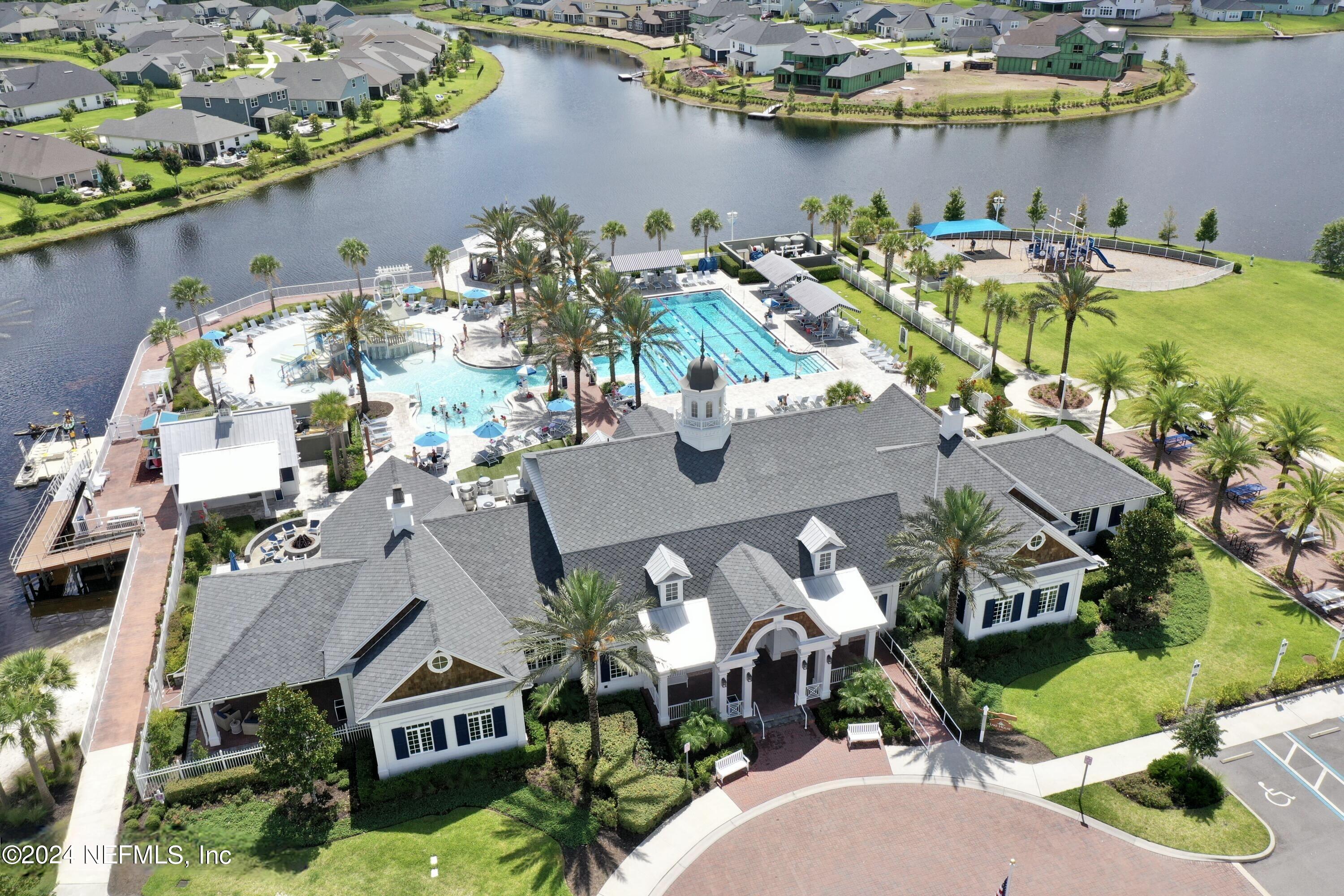 212 Concave Lane St. Augustine, FL 32095 - Photo 23 of 24 an aerial view of a house with a swimming pool and outdoor seating