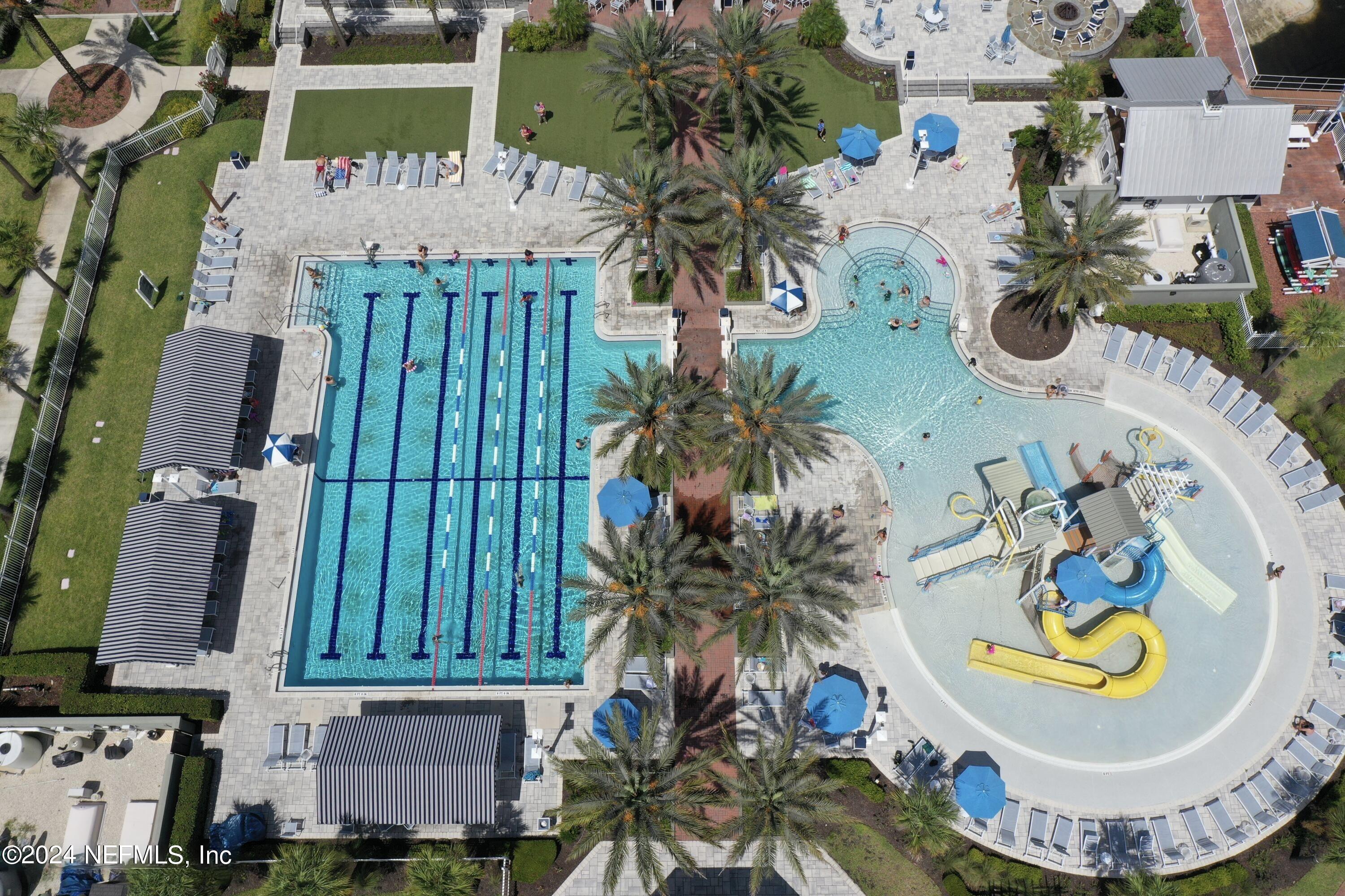212 Concave Lane St. Augustine, FL 32095 - Photo 24 of 24 an aerial view of a house with swimming pool and porch