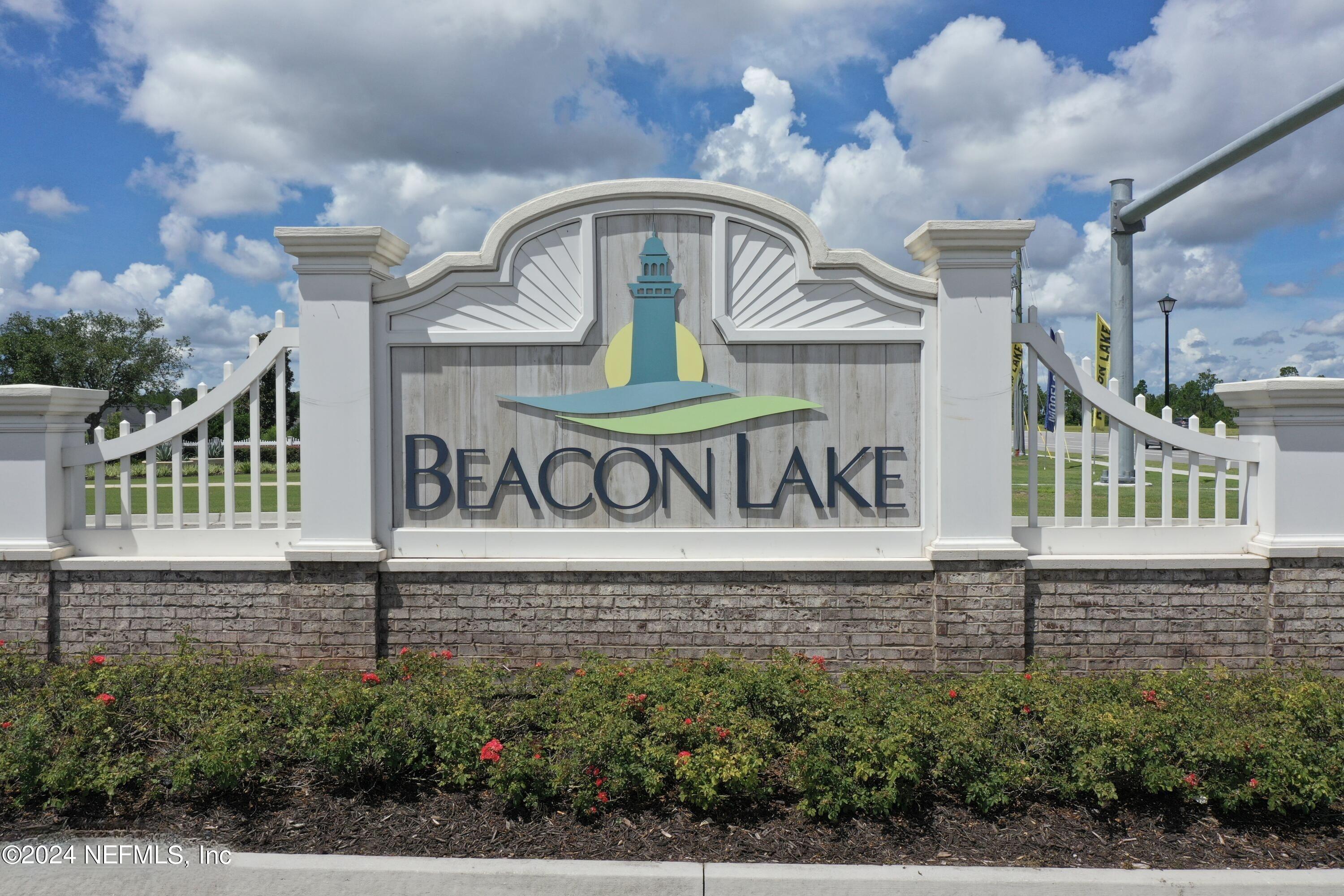 212 Concave Lane St. Augustine, FL 32095 - Photo 3 of 24 a front view of a house with a garden