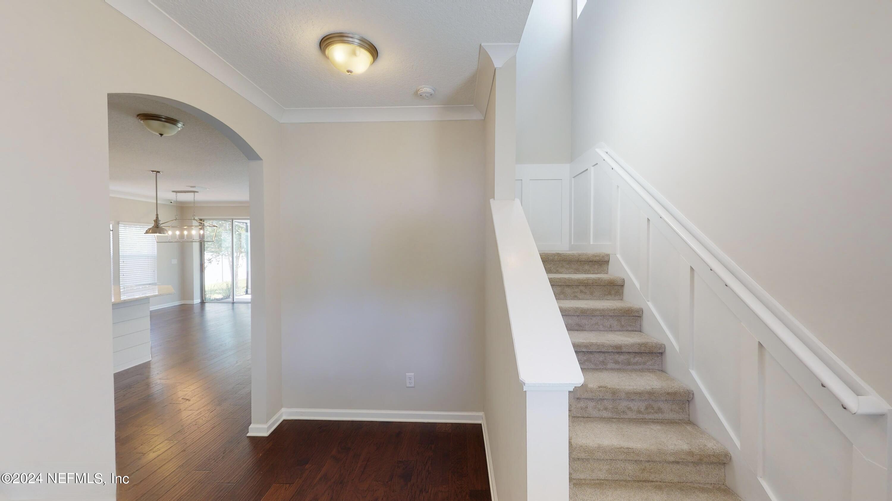 212 Concave Lane St. Augustine, FL 32095 - Photo 5 of 24 a view of entryway and hall with wooden floor