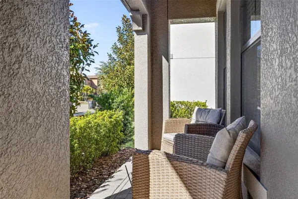 a view of an entryway with wooden floor