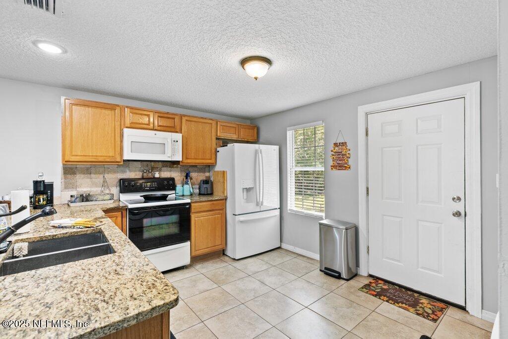 10519 Slay Road Jacksonville, FL 32219 - Photo 9 of 25 015-10519SlayRoad-Jacksonville-FL-32219-