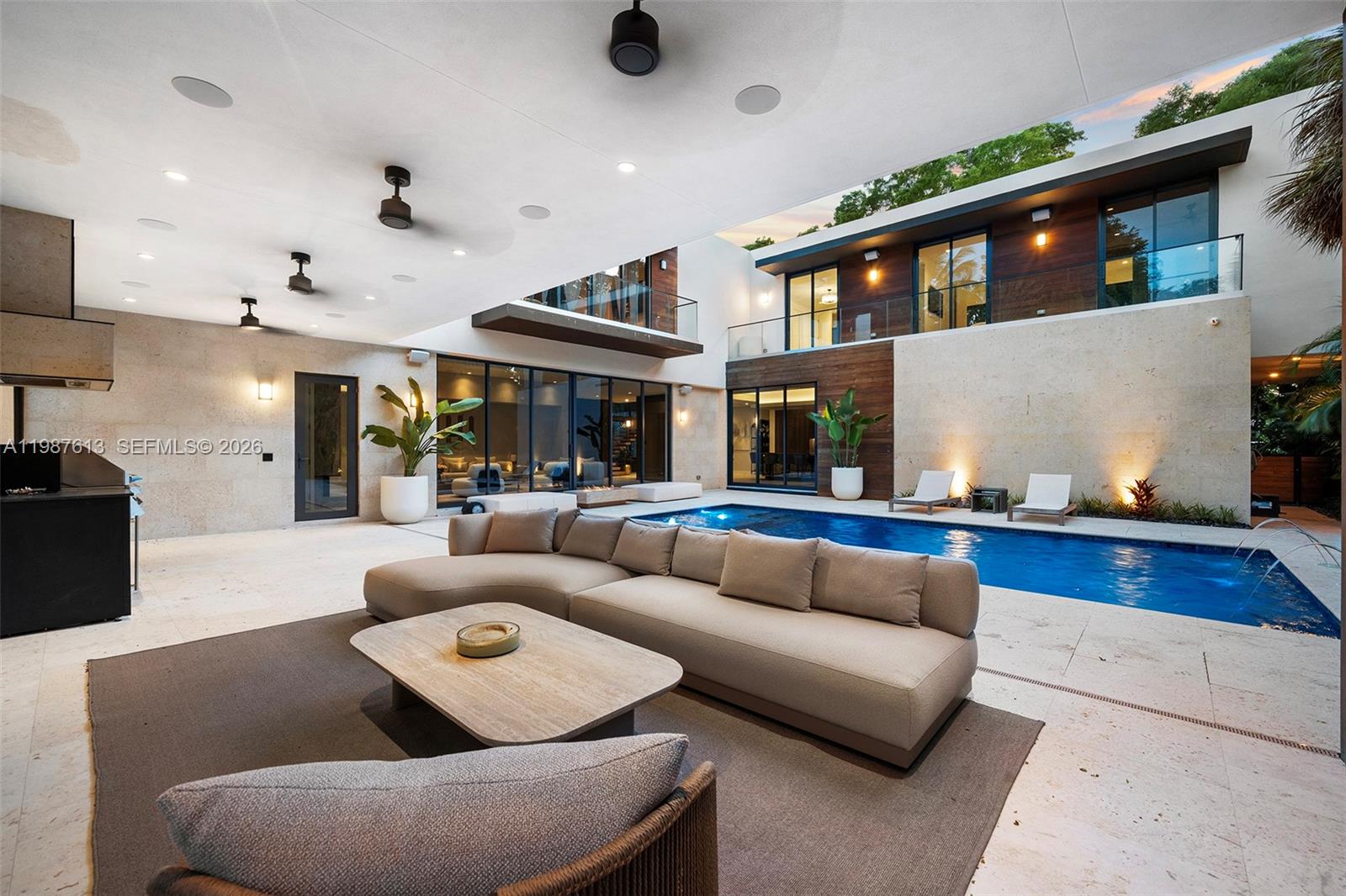 4041 South Le Jeune Road Miami, FL 33133 - Photo 27 of 30 a living room with furniture and a large window