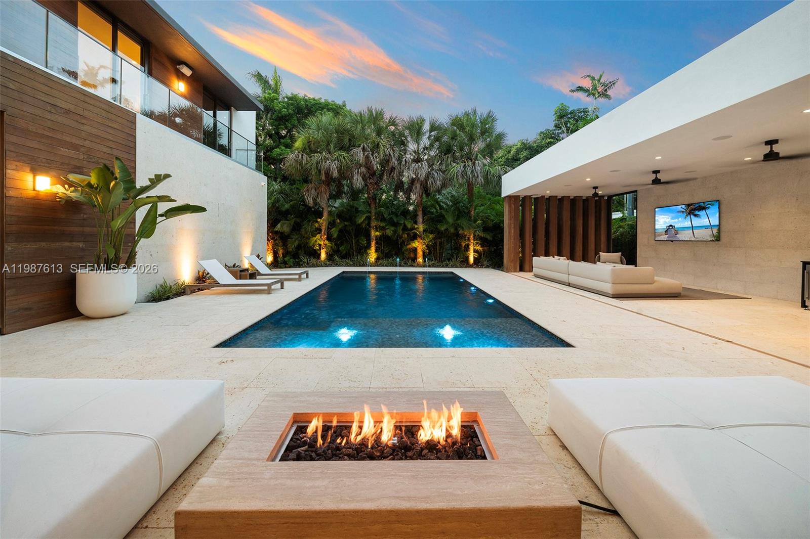 4041 South Le Jeune Road Miami, FL 33133 - Photo 28 of 30 a view of a backyard with plants and a patio