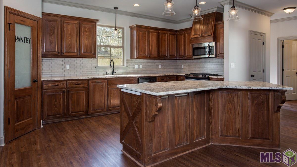 17620 Joe Sevario Road Prairieville, LA 70769 - Photo 9 of 29 SAMPLE OF COMPLETED HOME