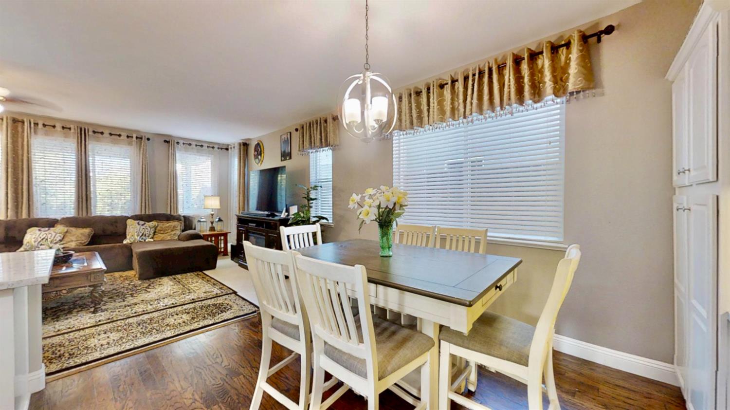 9573 Spring River Way Elk Grove, CA 95624 - Photo 12 of 53 a view of a dining room with furniture